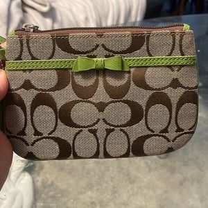 Coach wristlet brown and green detail